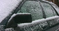 Scraping ice off car. Timelapse shot. Footage