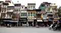 Streets of Hanoi in a busy day, Motocycles and cars traffic in Old Town, Vietnam Footage