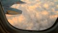 Clouds Below from Plane Window GFHD Footage