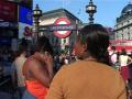 Women waiting at Underground Entrance, London England GFSD Footage