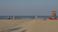 People relaxing and walking on the beach, Rimini, Italy, Footage
