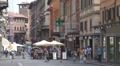 Beautiful street in Old Town of Bologna, commercial road shopping area Italy Footage