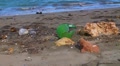 Pollution - Plastic Trash Garbage Rubbish bags left on beach 2 Footage