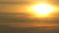 Sunset time-lapse through Misty Orange Clouds Footage
