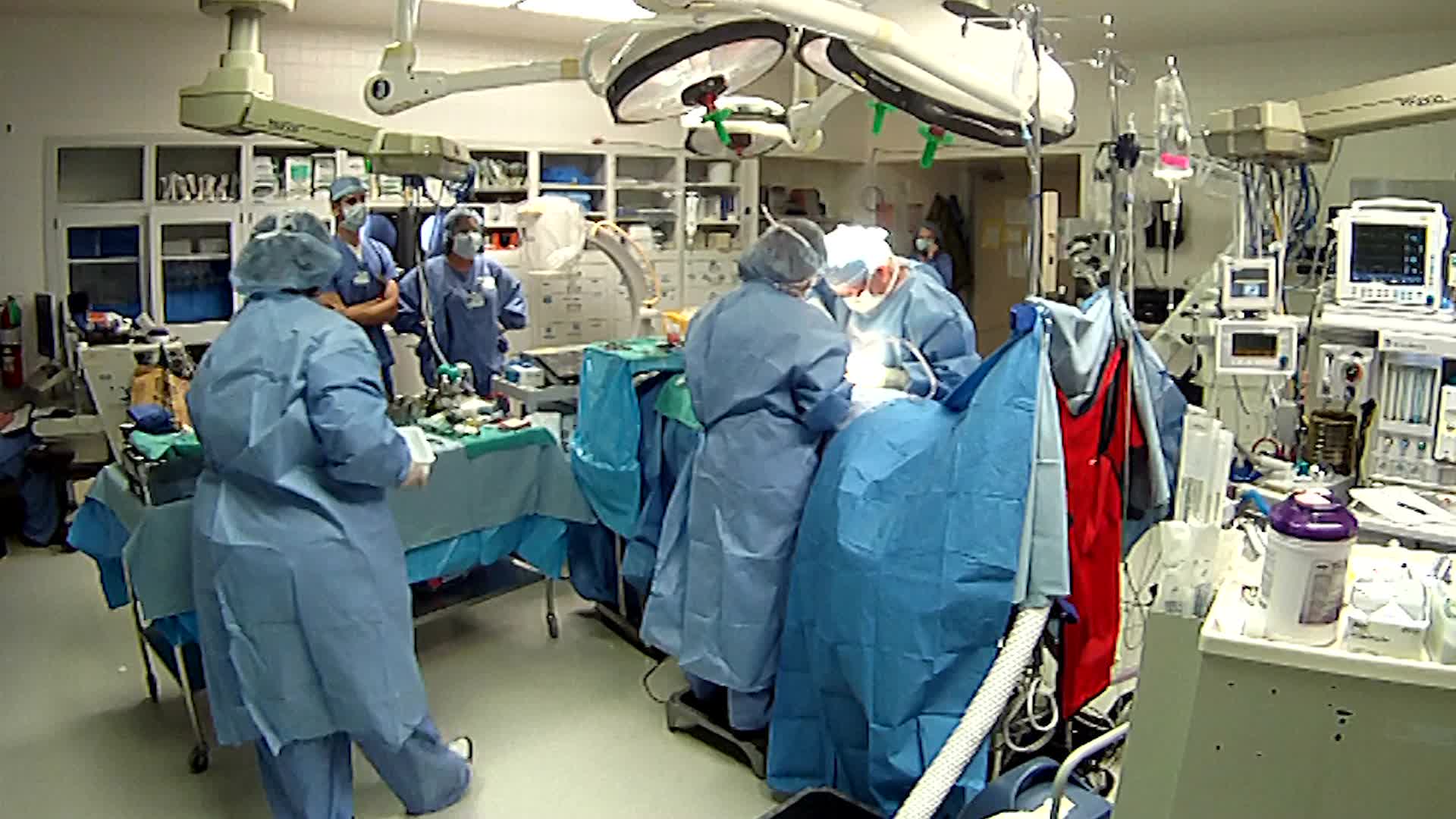 Super wide shot of operating room during surgery ~ Hi Res #12372991