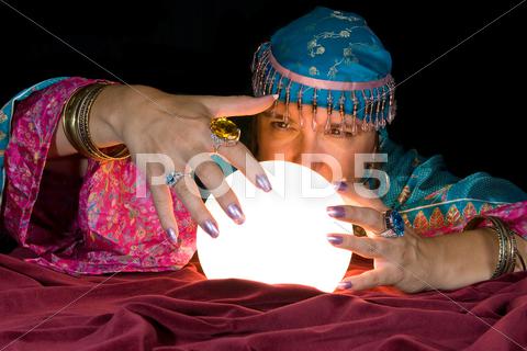 Stock photo of fortune teller and crystal ball