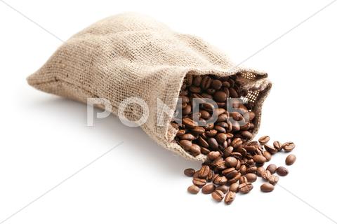 Stock photo of coffee beans in jute bag