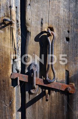 Stock photo of hand technology door hook lever metal old shadow