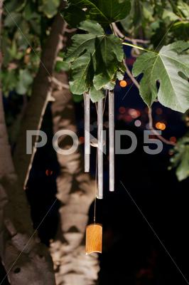 Stock photo of Wind chimes at night