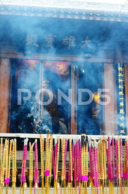 Stock photo of burning incense sticks