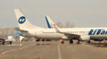 Boeing-737 UTair, board room VQ-BQP at the terminal Footage