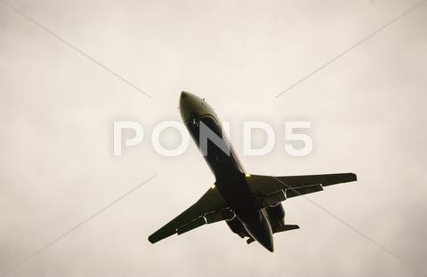 Stock photo of airplane in the sky