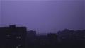 Large wide lightning bolt strikes night city, sounds of rain and thunder Footage