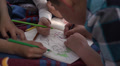Children are coloring with colored pencils Video