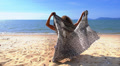 Nude Woman Relaxing on the Beach with Pareo. Slow Motion. Video