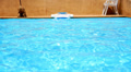 Resort Pool Water Ripples in the Sunlight. Chilling out in Thailand. Video