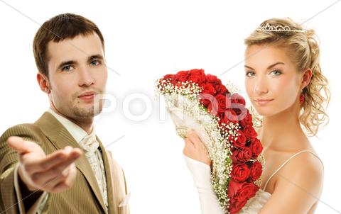 Stock photo of bride and groom isolated on white background