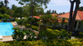 Summer Landscape Panorama. Azure Private Pool next to Tropical Island Villa. Video
