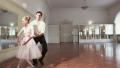Pas de deux, female male ballet dancers taking steps together Video