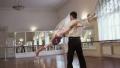 Classical ballet dancing, man flips woman upside down and twirls Video