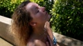 Sensual Woman in Shower near Poolside. Slow Motion. Video