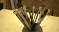Paint brushes in the pot on the table at drawing lesson Video
