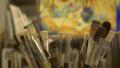 Paint brushes in the pot on the table at drawing lesson Video