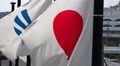 Japanese Flag Waving In The Wind At Port Of Shimonoseki Japan Footage